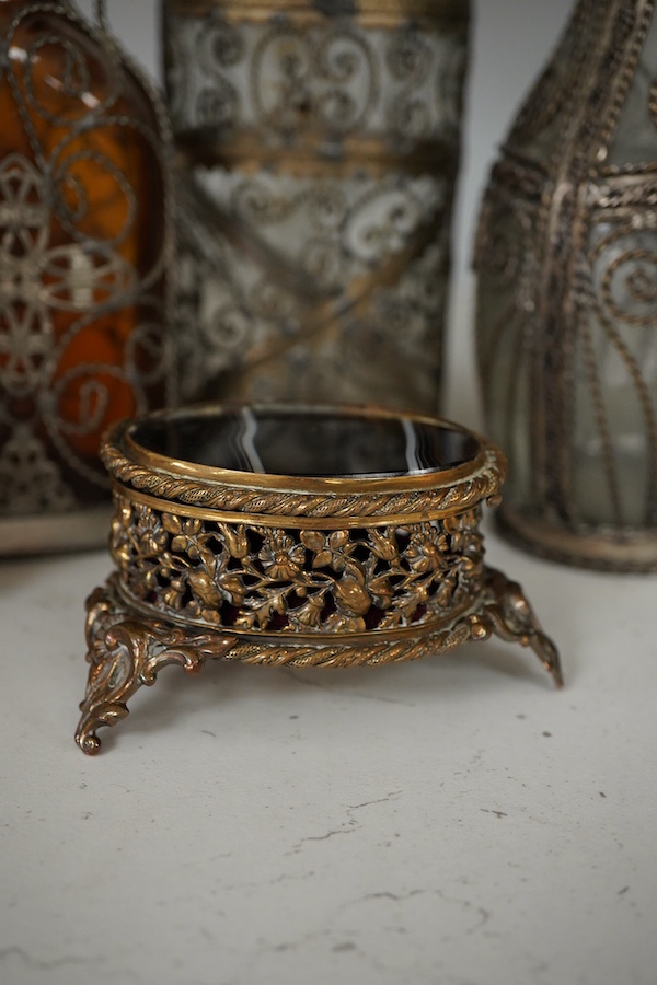 A collection of continental glass and wire worked bottles and flasks and a gilt metal onyx trinket box, tallest 19.5cm